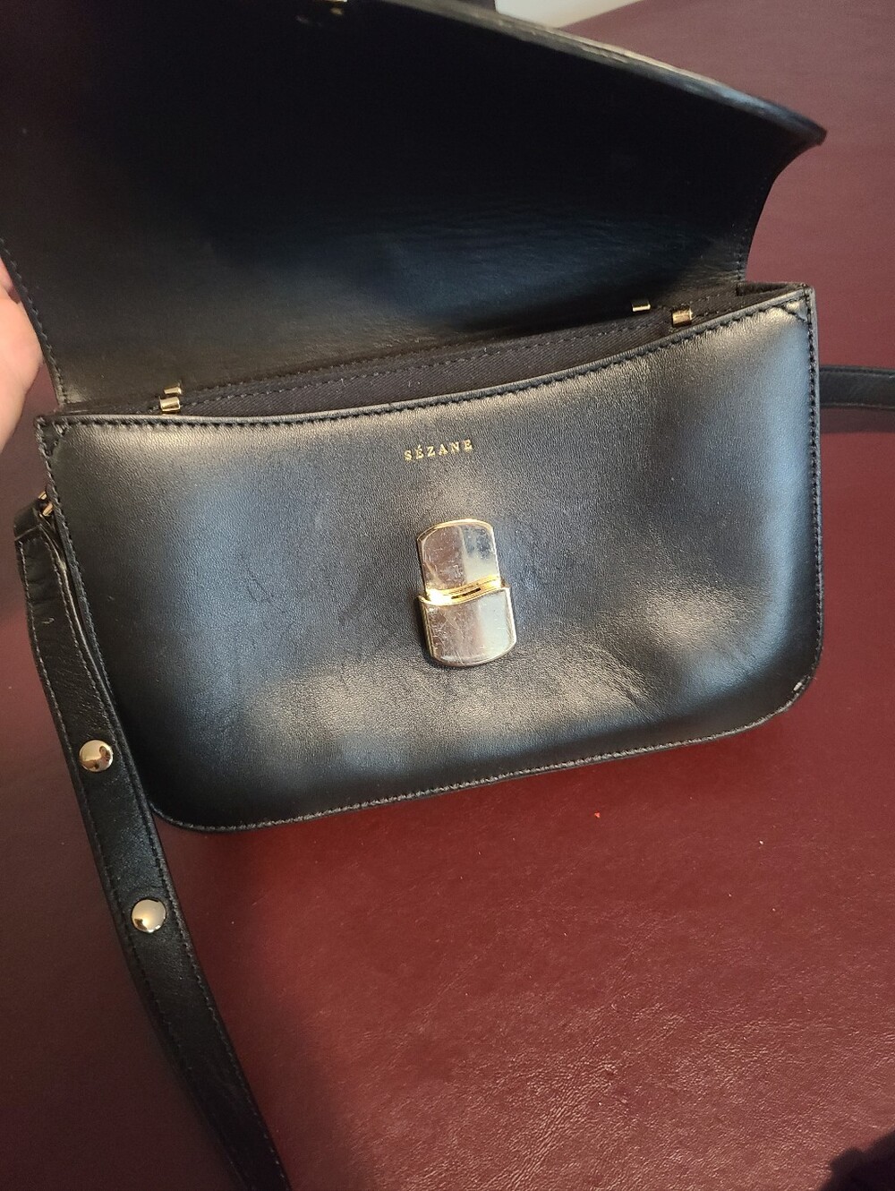 Black Leather Crossbody Bag with Gold-Tone Clasp